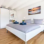 Prora - Familienfreundliche Ferienwohnung mit Balkon, Waschmaschine, Trockner und Gemeinschaftssauna - Dünenheide 3,4