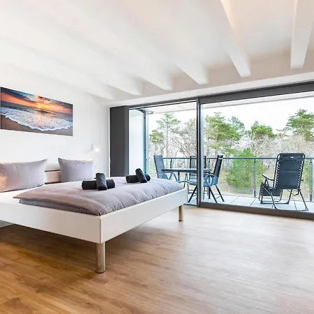 Prora - Familienfreundliche Ferienwohnung mit Balkon, Waschmaschine, Trockner und Gemeinschaftssauna - Dünenheide 3,4 *