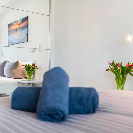 Prora - Familienfreundliche Ferienwohnung mit Balkon, Waschmaschine, Trockner und Gemeinschaftssauna - Dünenheide 3,4 Binz